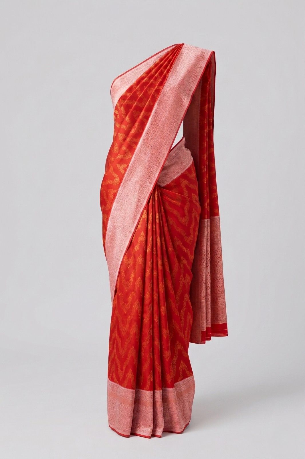 Red and gold combination saree for women with elegant woven border