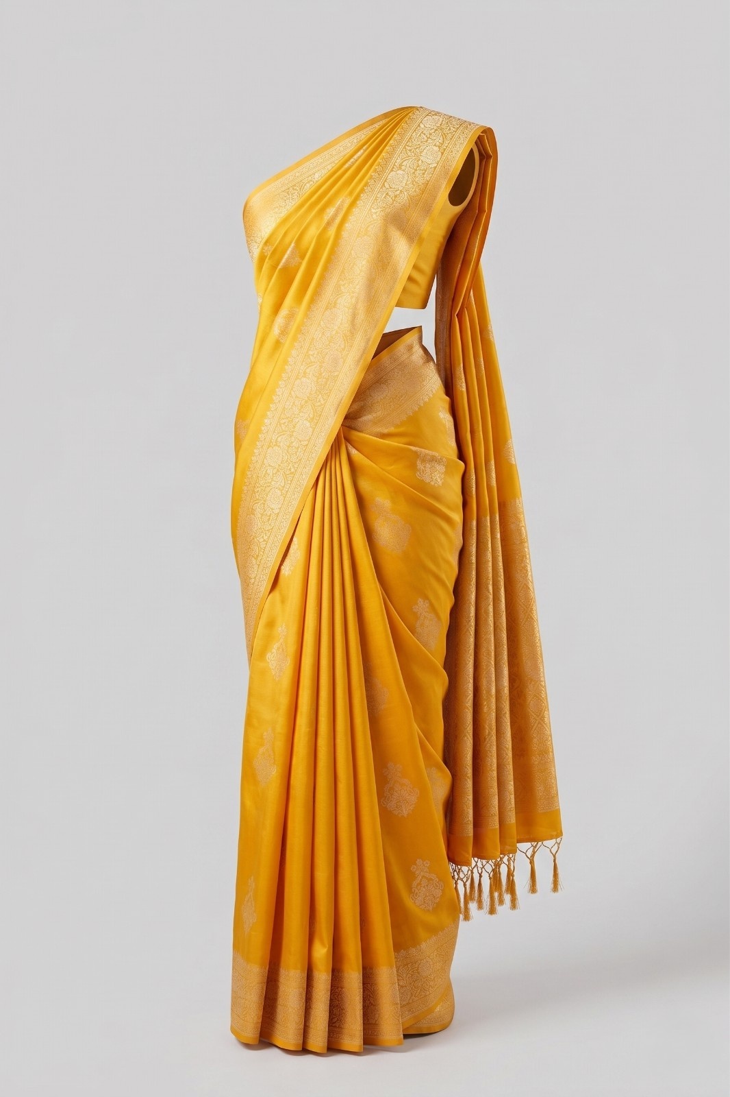 Yellow soft silk saree for women with elegant golden woven border