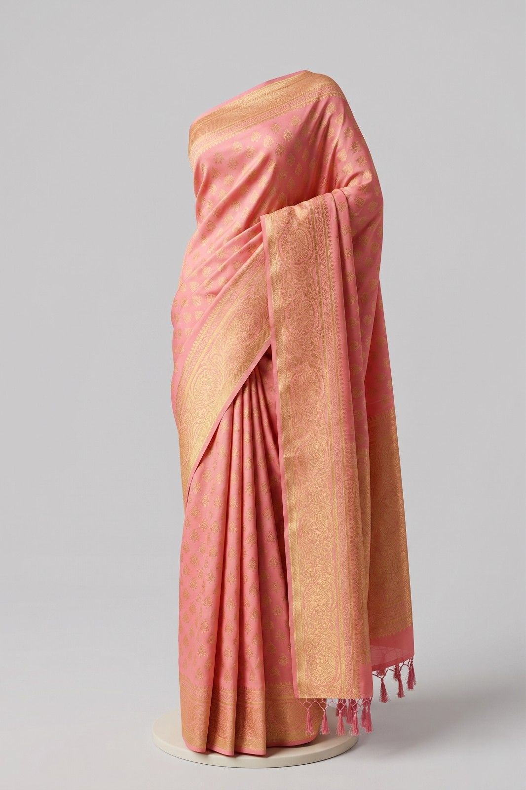 Pink soft silk saree for women with elegant golden woven border