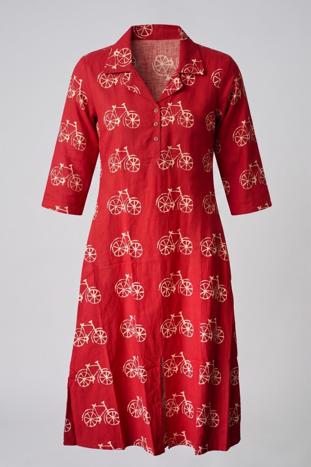 Women’s red cotton dress with bicycle print, collared neckline, and relaxed A-line fit